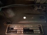 a close up of a car ' s engine with a sticker on it