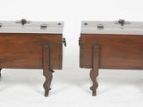 pair of antique wooden side tables with metal handles and legs