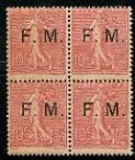 a stamp with four different letters on it