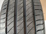 a close up of a tire on a table with a box in the background