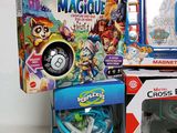 many different toys and games on display on the table
