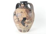 a vase with a picture of a man and a dog on it