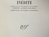 an open book with a black and white image of the title of a novel