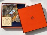 an orange box with a picture of a castle inside of it