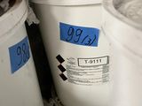 several buckets of cement sitting next to each other on a shelf