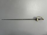 a small knife that is hanging on the wall