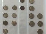a lot of coins that are in a plastic bag