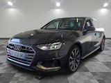 audi ' s new all - wheel drive suv is parked in a showroom