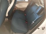 a seat in the back of a car that is blue