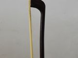 a close up of a cane with a stick sticking out of it
