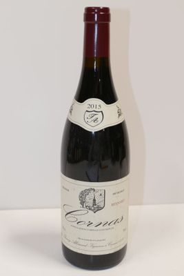 a bottle of wine that is sitting on a table