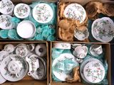two boxes of tea cups and saucers in the same box