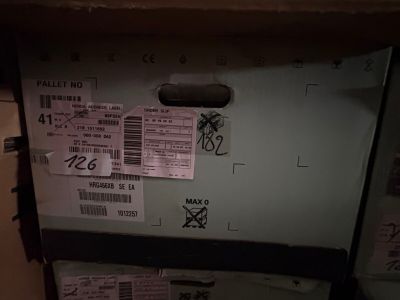 an image of a refrigerator with a lot of stickers on it