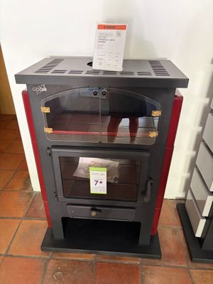 a stove that is sitting on the floor in a room
