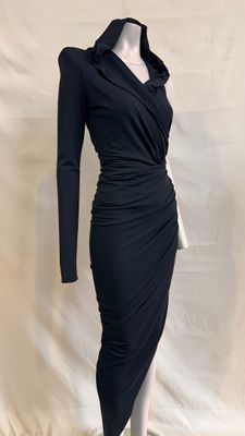 a black dress with long sleeves on a mannequin mannequin mannequin mannequin mann
