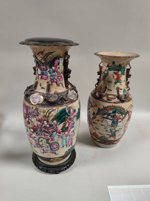 two vases that are sitting on a table