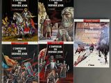 four books on a table with a picture of a man on a horse