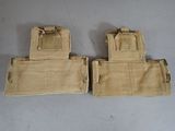two tan canvas pouchs on a white surface with one open and the other closed