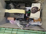 a box with a keyboard, mouse, and other electronics inside of it