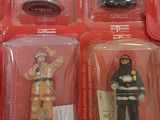 six different firemen figurines in the package