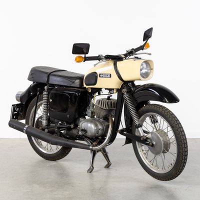 a motorcycle that is parked in a room