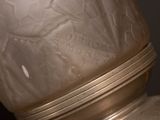 a close up of a lamp that is on a table