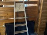 a ladder leaning up against a wall in a room