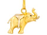 une image représentant un éléphant doré avec une selle sur le dos