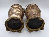 pair of antique chinese vases with gold decoration on them