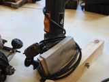 many tools that are sitting on a table in the room