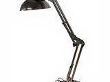 a black desk lamp with a metal base and a black shade