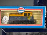 a toy train that is in a box on a table