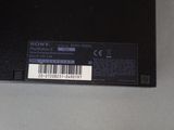 a black sony laptop with a bar code on it