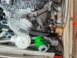 a box full of assorted items in a garage