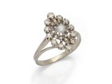a diamond cluster ring, by van cleef