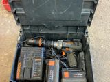 a tool box with tools in it sitting on the floor