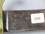 a close up of a metal handle with a tag on it