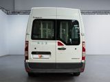 a white van that is parked inside of a building