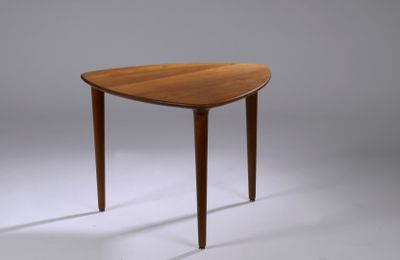 an image of a small table with a wooden top and legs
