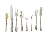 five forks, a knife, and a spoon on a white surface