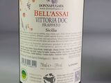a bottle of wine that is sitting on a table