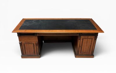 une image représentant un bureau avec un plateau noir et des pieds en bois