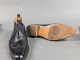 a pair of shoes that are sitting on the floor