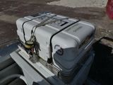 a white suitcase sitting on top of a white truck