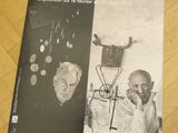 a book on a table with a picture of a man and a woman