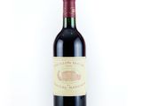a bottle of wine that is sitting on a table