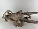 an image of a statue of an elephant made of wood
