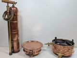 a copper fire extinguisor and a copper bowl