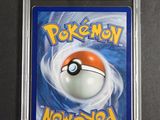 a close up of a card with a pokemon ball on it