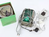 a box of electrical cords and a box of wires on a white surface